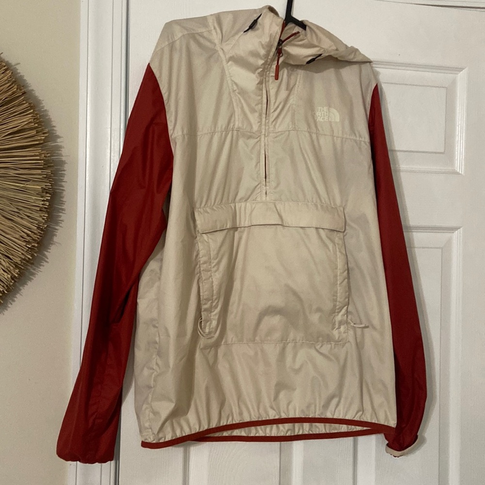 Tan and burnt orange windbreaker